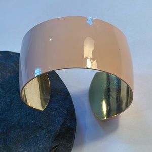 Peach enamel over gold tone cuff braceletp